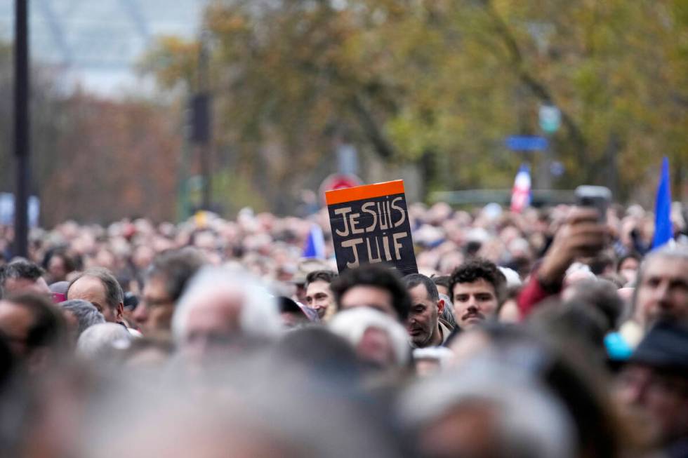 Thousands gather for a march against antisemitism in Paris, France, Sunday, Nov. 12, 2023. Fren ...