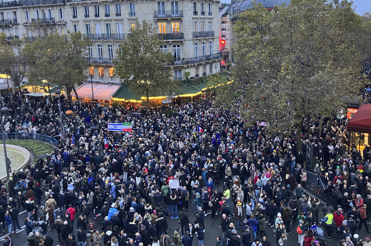 Thousands gather for a march against antisemitism in Paris, France, Sunday, Nov. 12, 2023. Fren ...