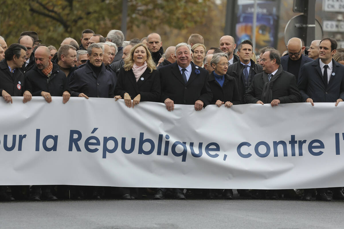 French Senate President Gerard Larcher, center, , President of the French National Assembly Yae ...