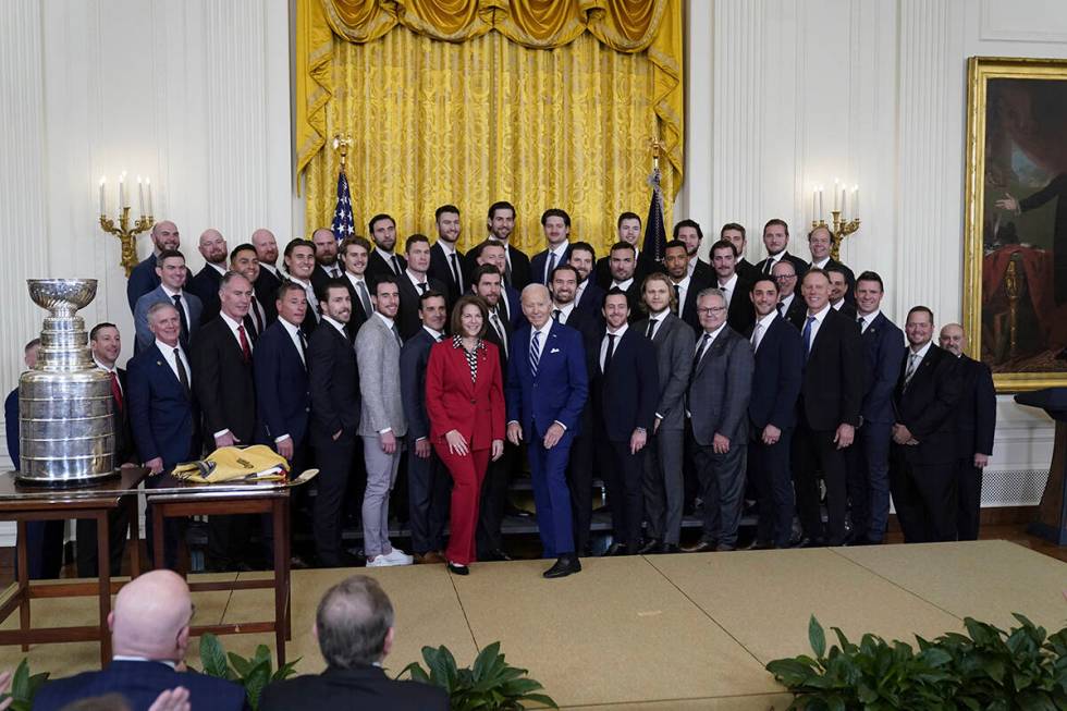 President Joe Biden stands for a photo during an event to celebrate the Vegas Golden Knights in ...