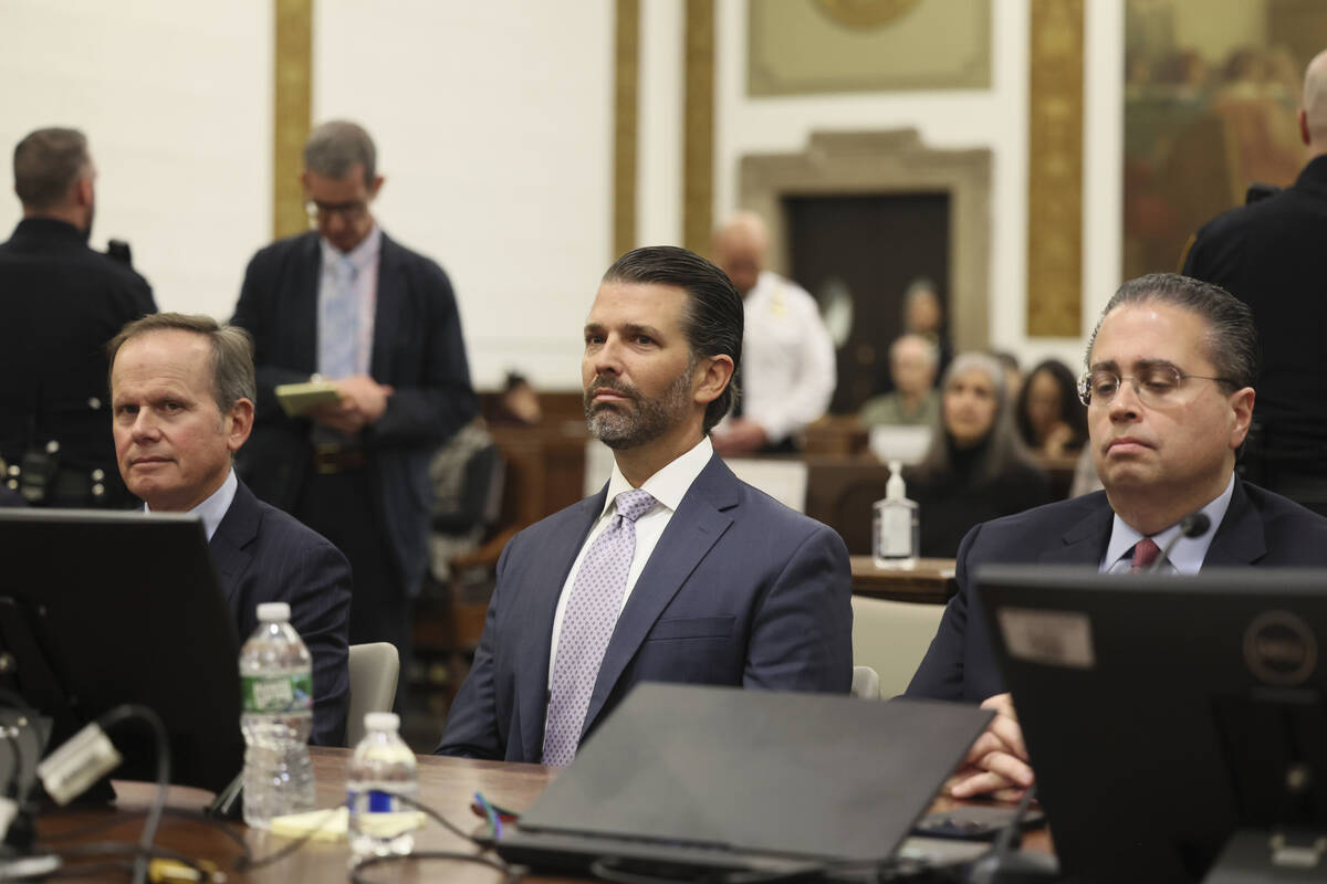 Donald Trump, Jr. sits in the courtroom with his legal team before the continuation of the civi ...