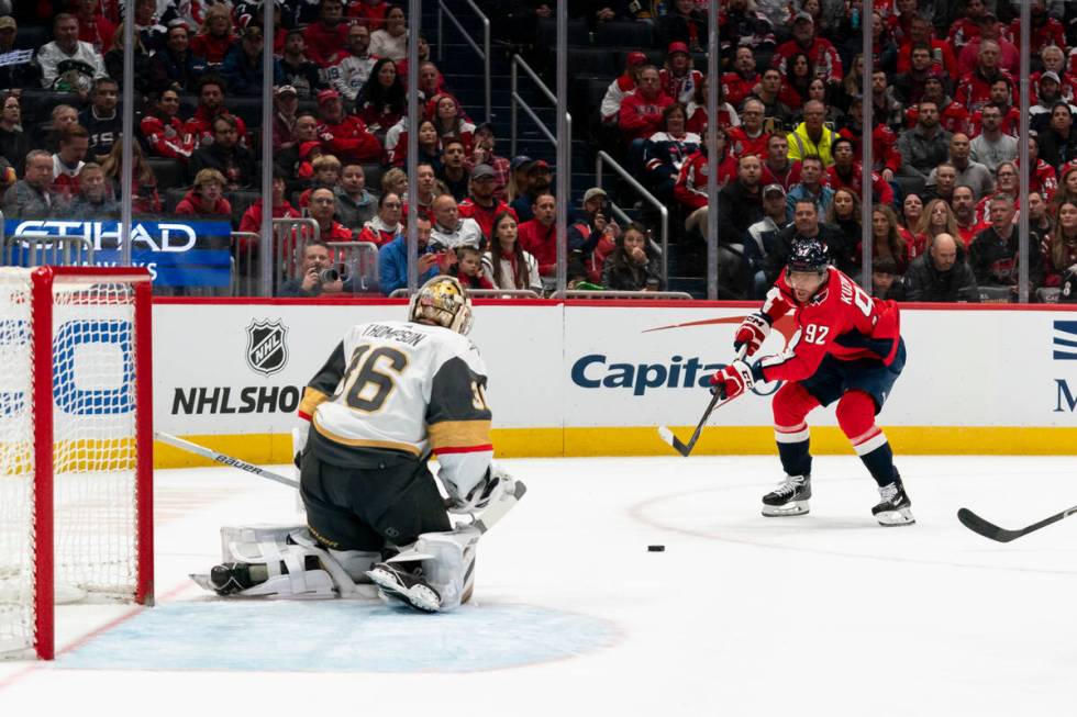 Washington Capitals center Evgeny Kuznetsov (92) takes a shot against Vegas Golden Knights goal ...