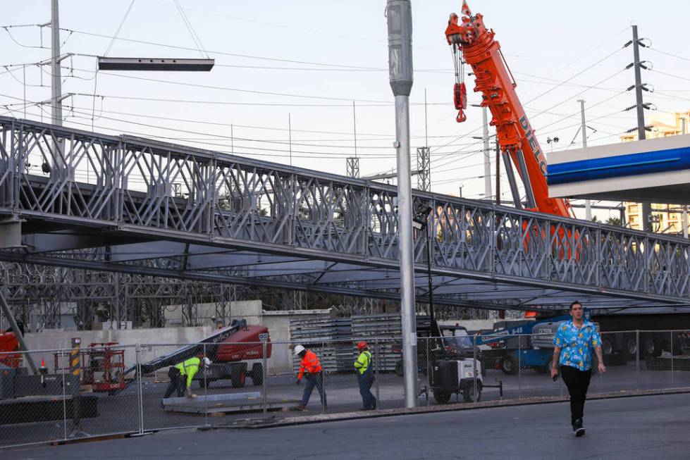 A bridge for the Formula 1 Las Vegas Grand Prix is under construction at the intersection of Fl ...