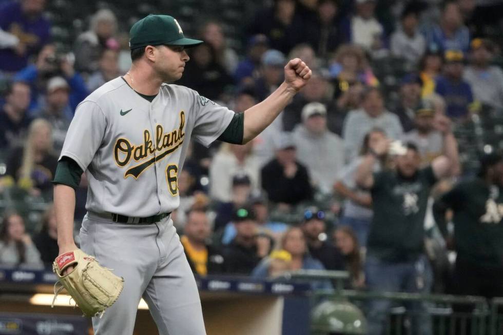 Oakland Athletics' Sam Long celebrates after a baseball game against the Milwaukee Brewers Sund ...