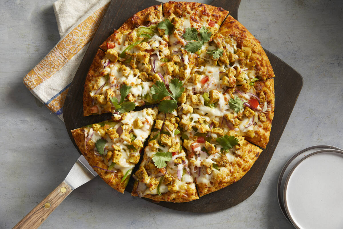 A curry chicken masala pizza from the new (as of fall 2023) Curry Pizza House in Las Vegas. (Cu ...