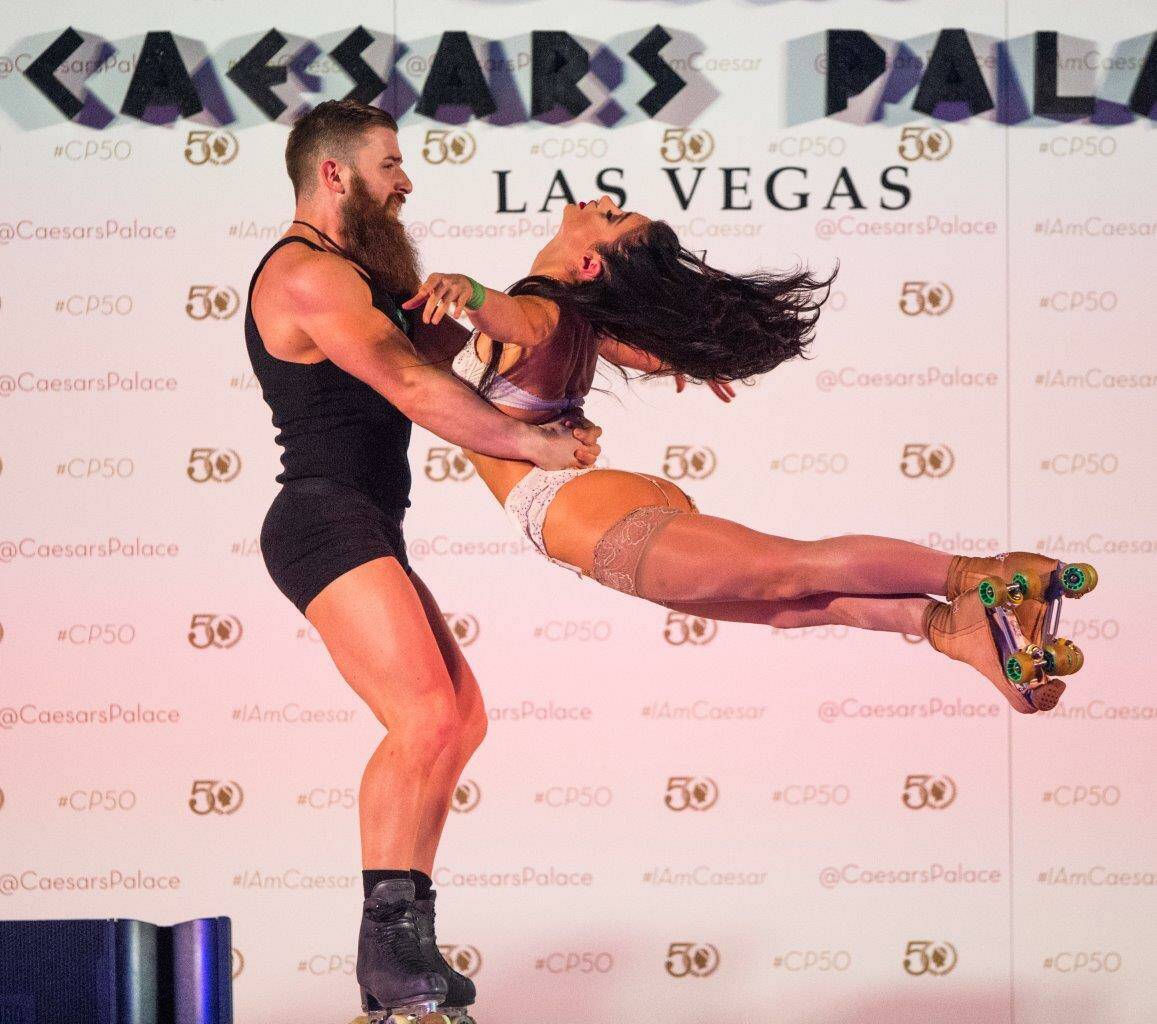 Brother-and-sister Billy and Emily England of “Absinthe” perform during Caesars Palace’s ...