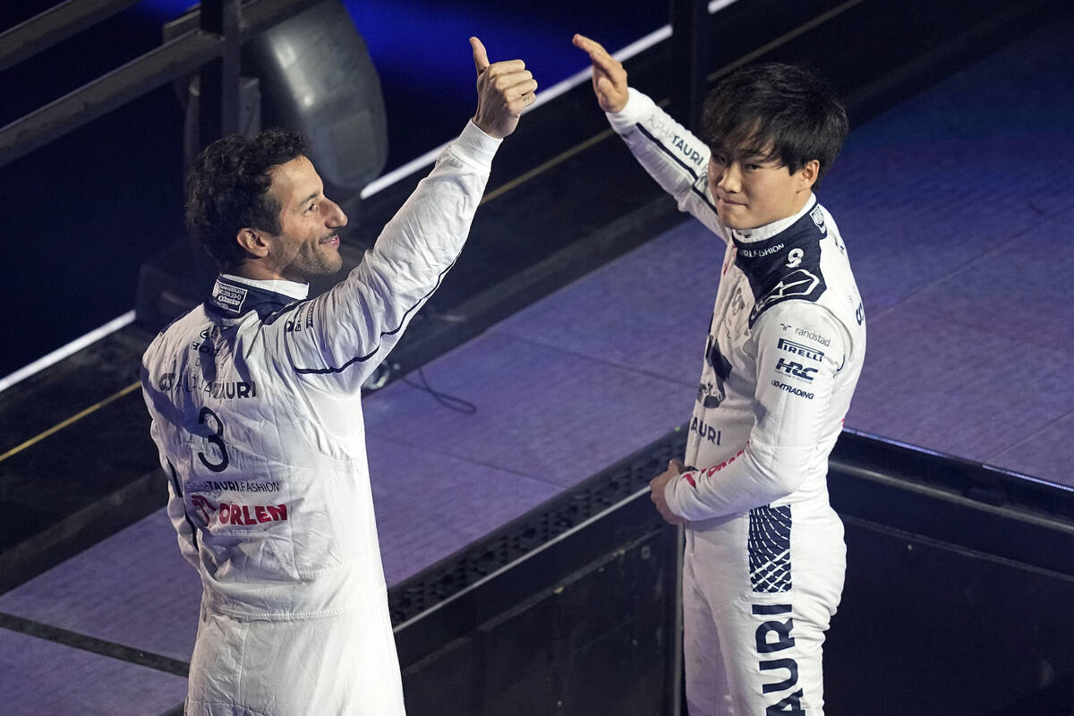 AlphaTauri driver Daniel Ricciardo, of Australia, left, and AlphaTauri driver Yuki Tsunoda, of ...