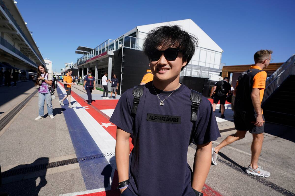 AlphaTauri driver Yuki Tsunoda of Japan arrives for the Formula One U.S. Grand Prix auto race a ...