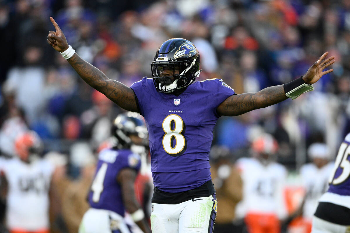 Baltimore Ravens quarterback Lamar Jackson (8) gestures during the second half of an NFL footba ...