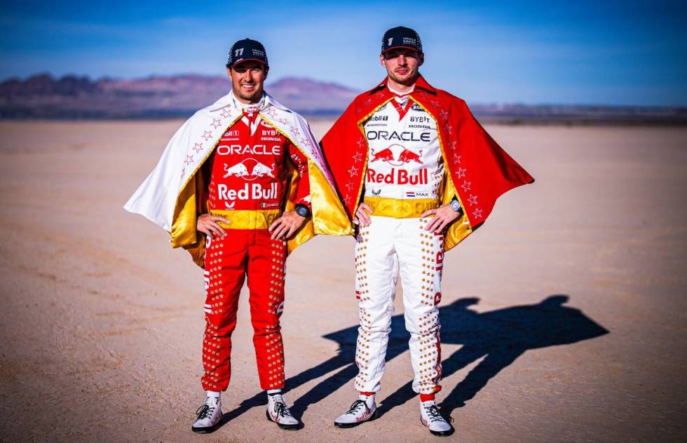 Oracle Red Bull Racing drivers Max Verstappen and Sergio Perez in "Viva Las Vegas" race suits i ...