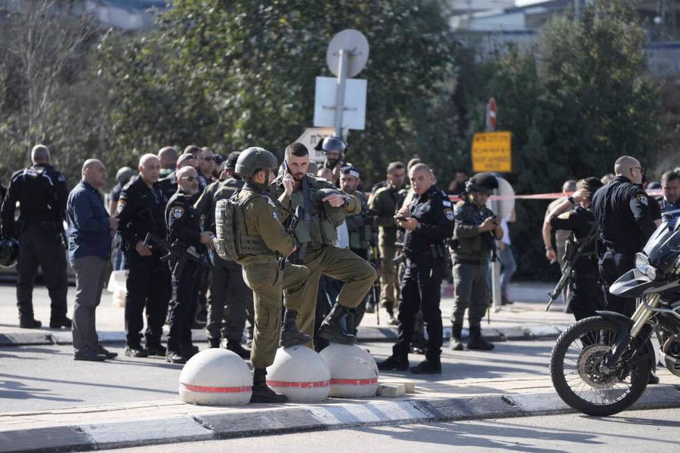 Israeli police stand at a checkpoint leading to the West Bank in Jerusalem Thursday, Nov. 16, 2 ...