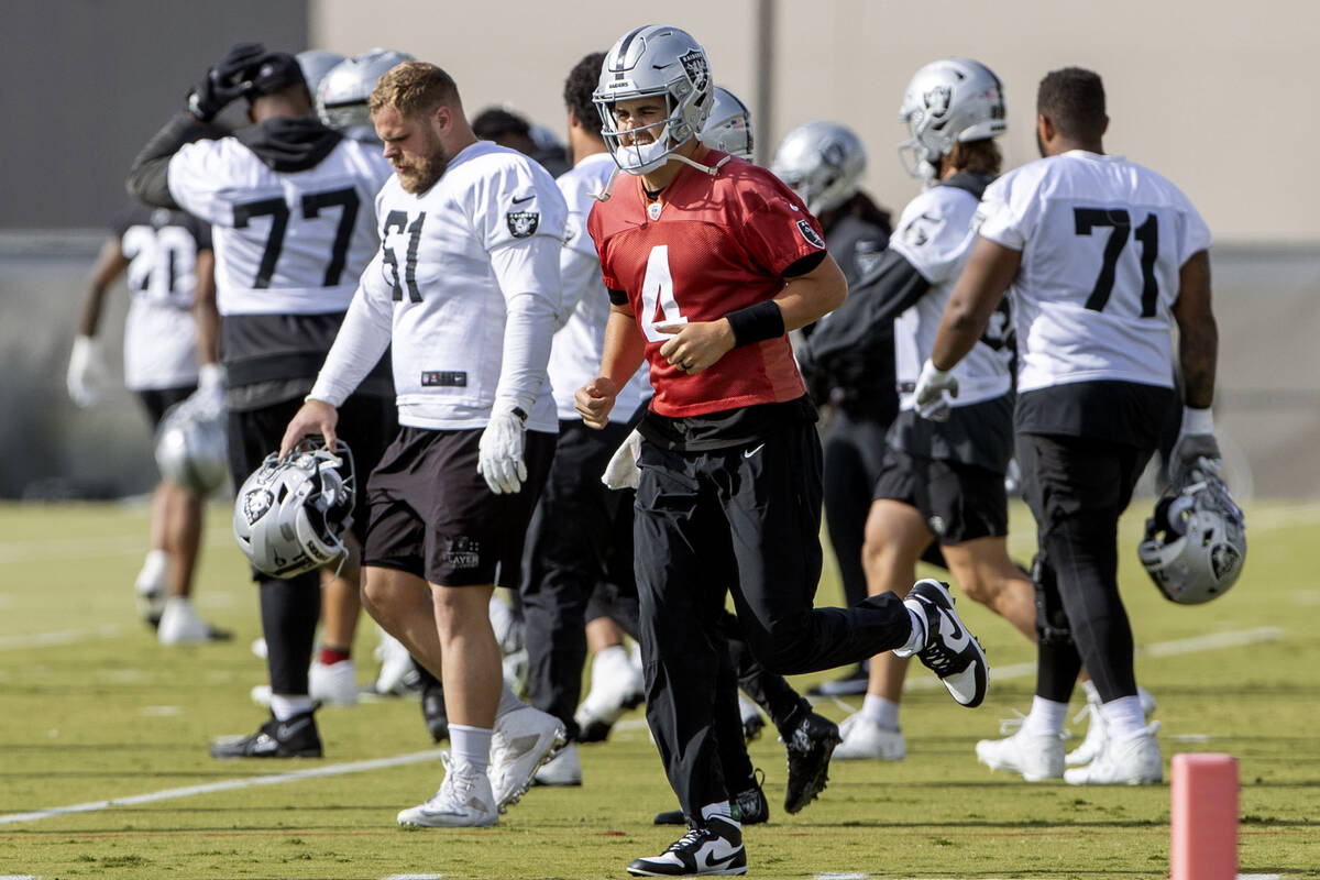 Raiders quarterback Aidan O'Connell (4) runs to drills during practice at the Intermountain Hea ...