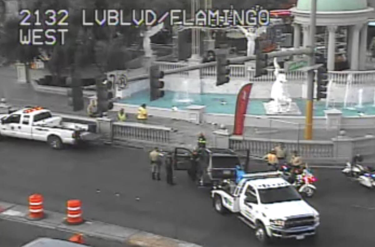 A tow truck prepares to remove a small SUV involved in a crash at East Flamingo Road and Las Ve ...