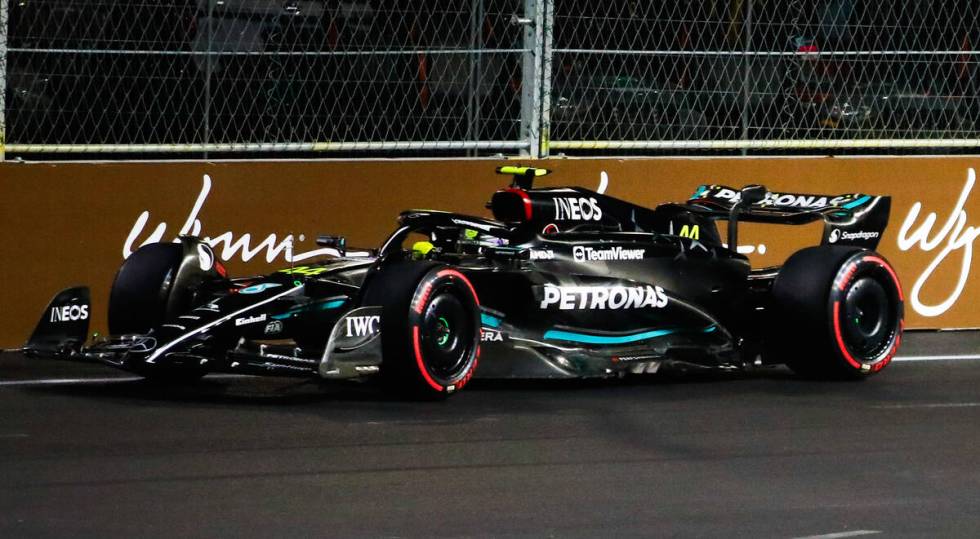 Lewis Hamilton competes in the first practice race for the Formula 1 Las Vegas Grand Prix on Th ...