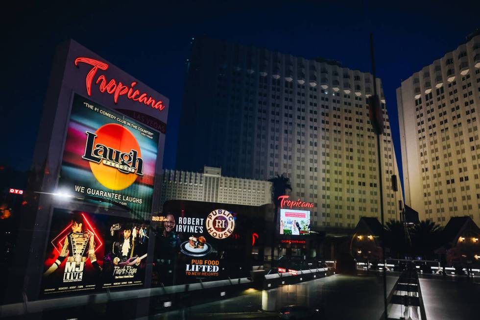 The Tropicana Las Vegas is reflected onto a pedestrian walkway bridge on Thursday, Nov. 16, 202 ...