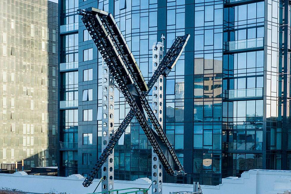 An "X" sign sits atop the social media platform's headquarters, in San Francisco, on July 28, 2 ...