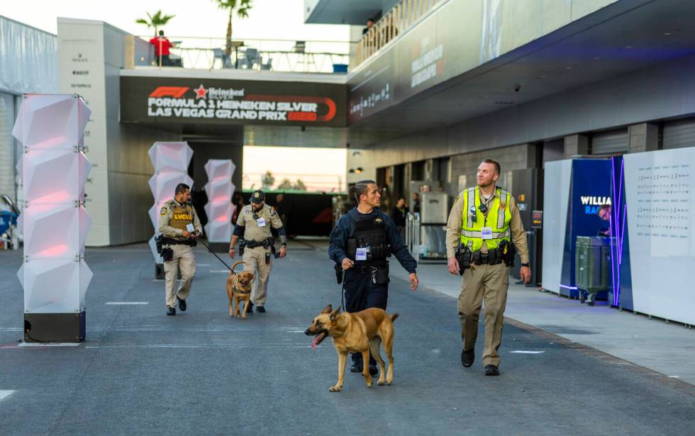 A police security detail walks about the pit building during the second night of the Las Vegas ...