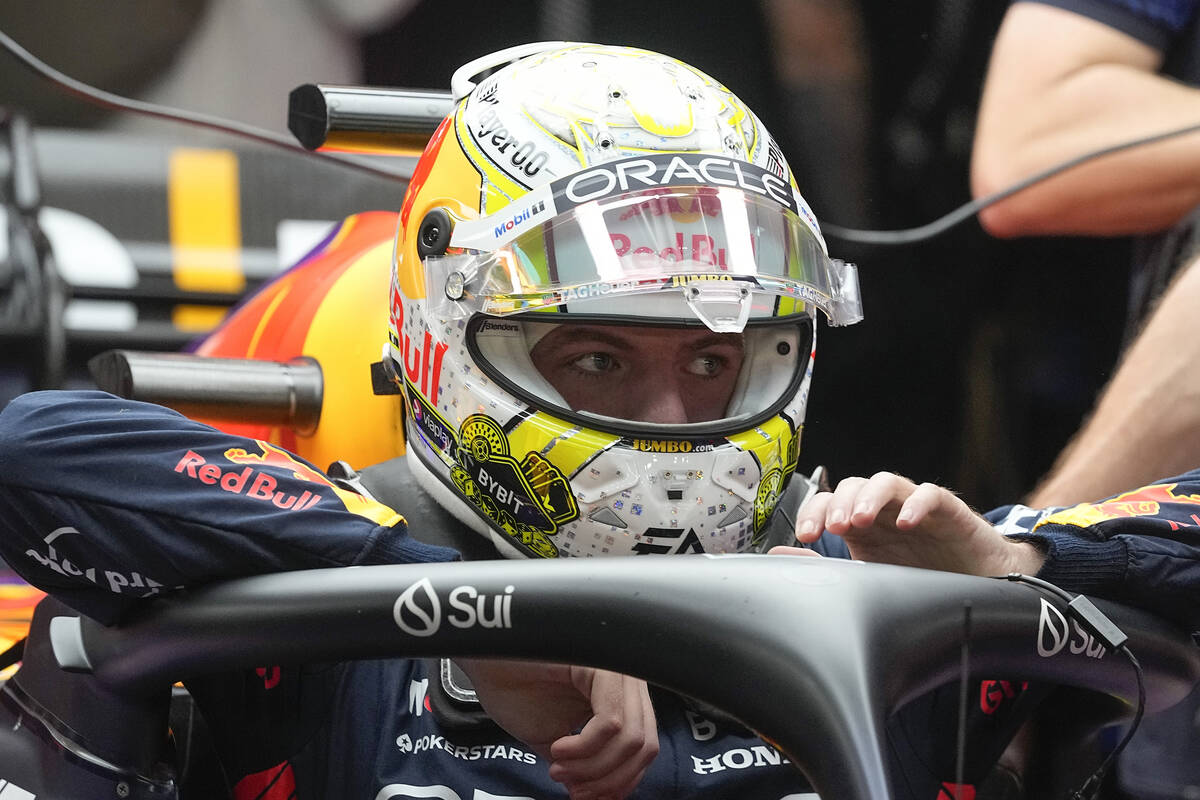 Red Bull driver Max Verstappen, of the Netherlands, climbs into his car during the final practi ...