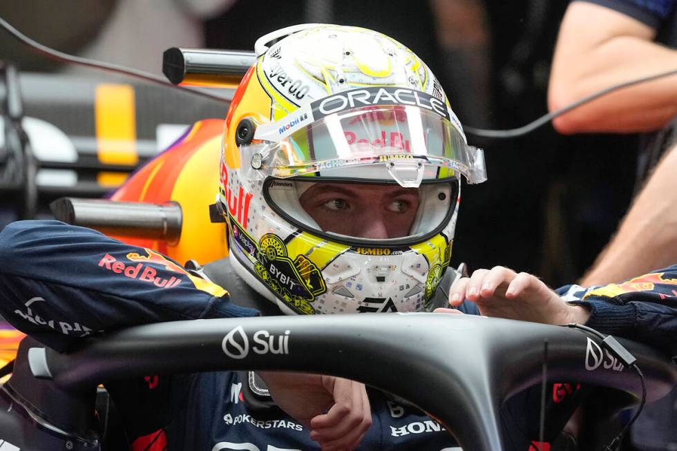 Red Bull driver Max Verstappen, of the Netherlands, climbs into his car during the final practi ...