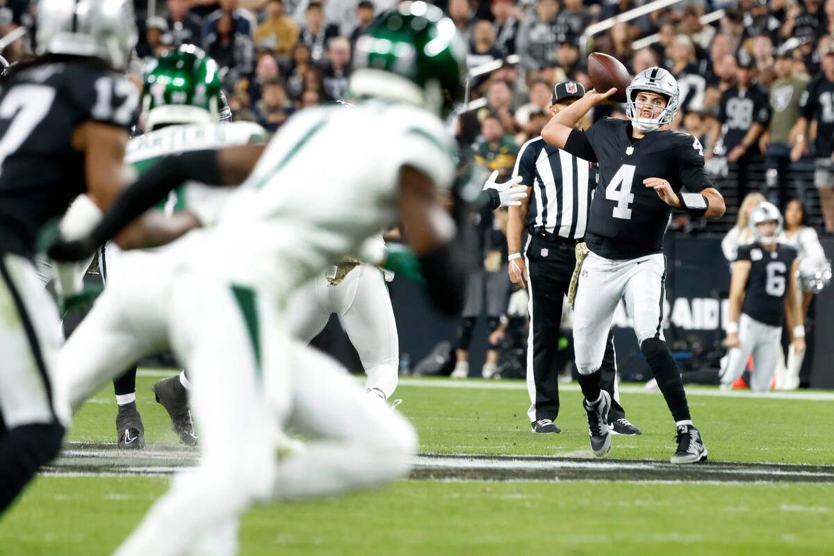 Raiders quarterback Aidan O'Connell (4) throws a pass against New York Jets during the second h ...