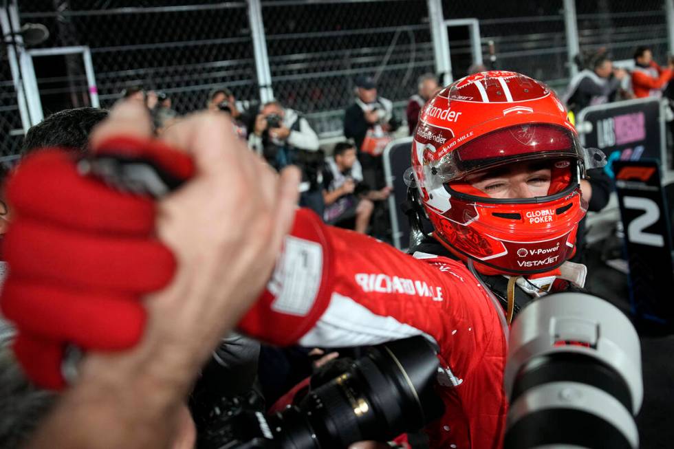 Ferrari driver Charles Leclerc, of Monaco, celebrates a second place finish during the Formula ...