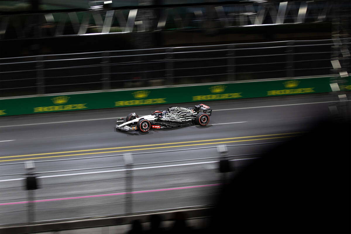 AlphaTauri driver Daniel Ricciardo rounds the circuit during qualifying for the Formula One Las ...