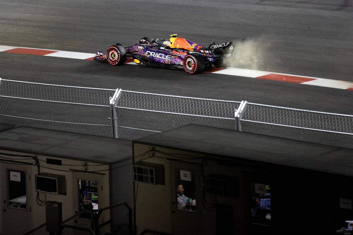 Red Bull Racing driver Sergio Perez rounds the circuit during qualifying for the Formula One La ...