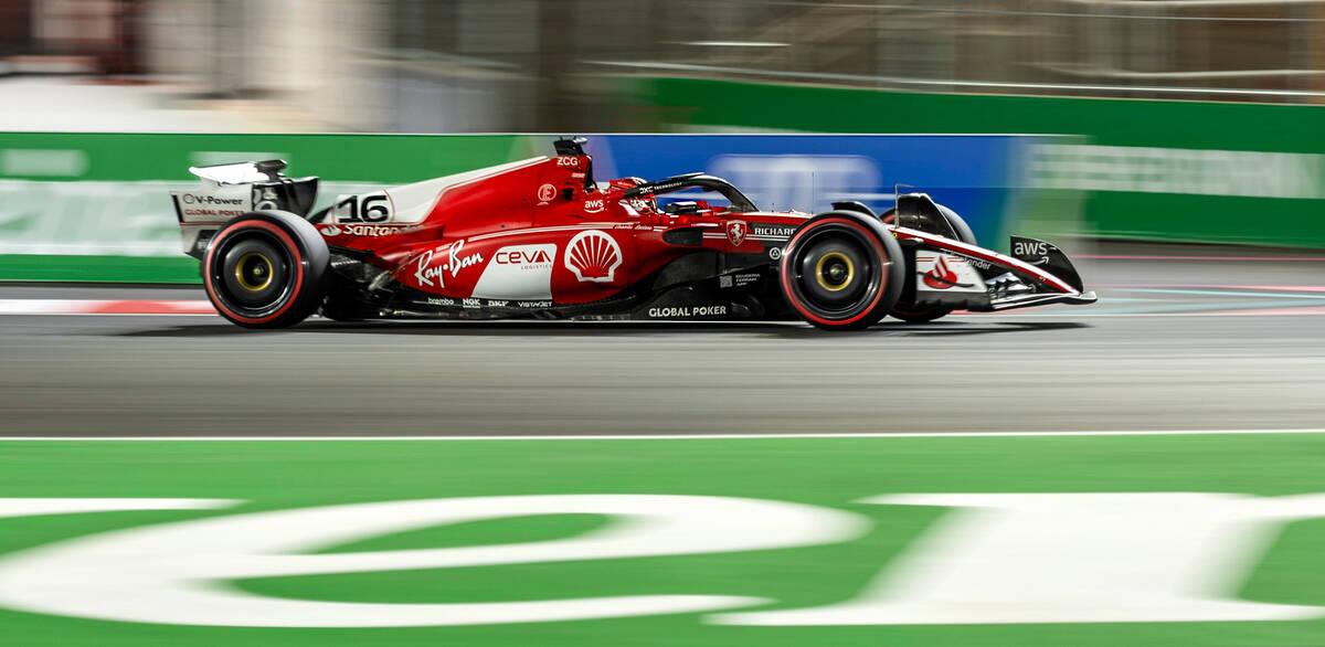 Ferrari driver Charles LeClerc rounds turn 1 during the qualifying session on the second night ...