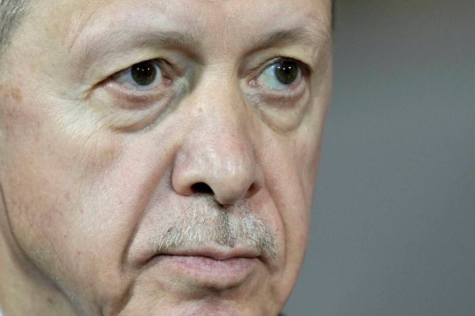 Turkey's President Recep Tayyip Erdogan gives a statement during his visit at the chancellery w ...