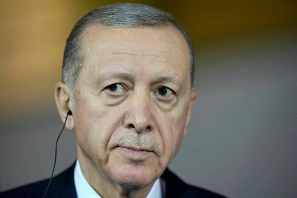 Turkey's President Recep Tayyip Erdogan gives a statement during his visit at the chancellery w ...