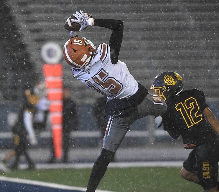 Legacy’s Jayson Schmidt makes a grab for a touchdown against Galena’s Anthony Martin during ...