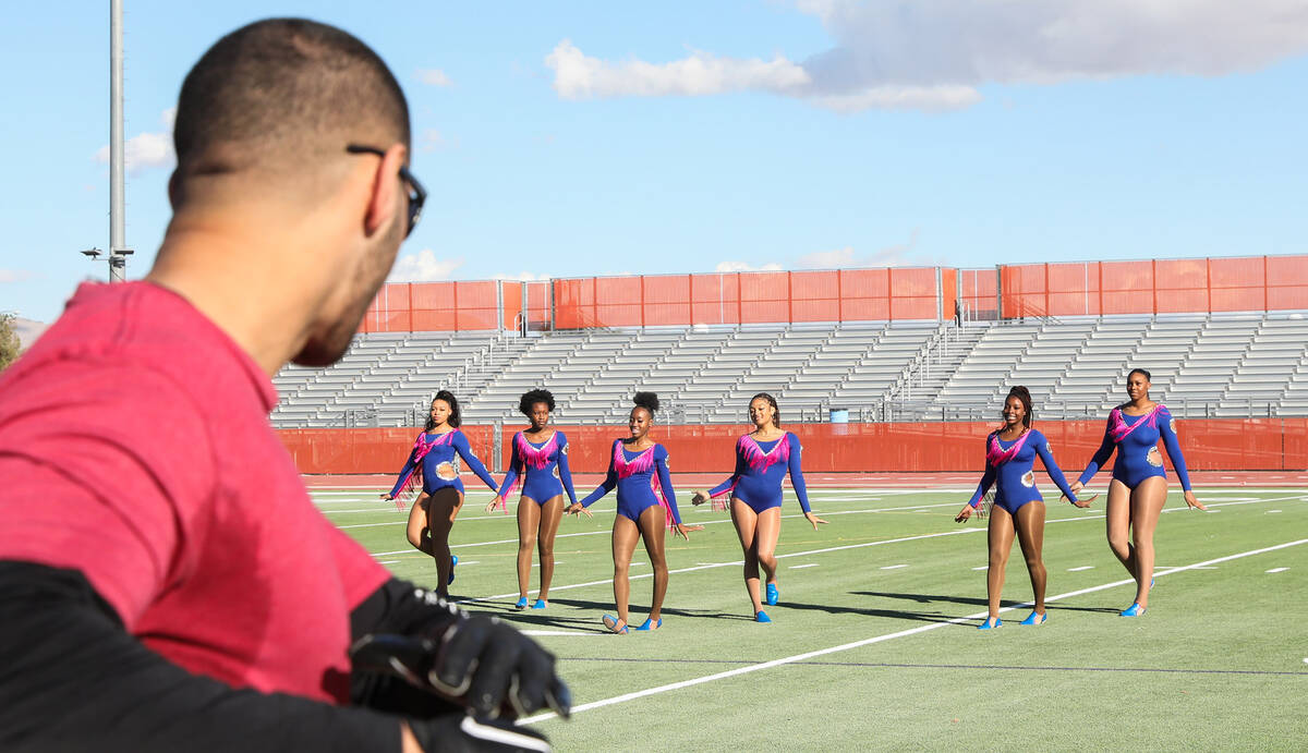 The Elite Sapphires Dance Company performs during halftime of the third annual Turkey Bowl betw ...