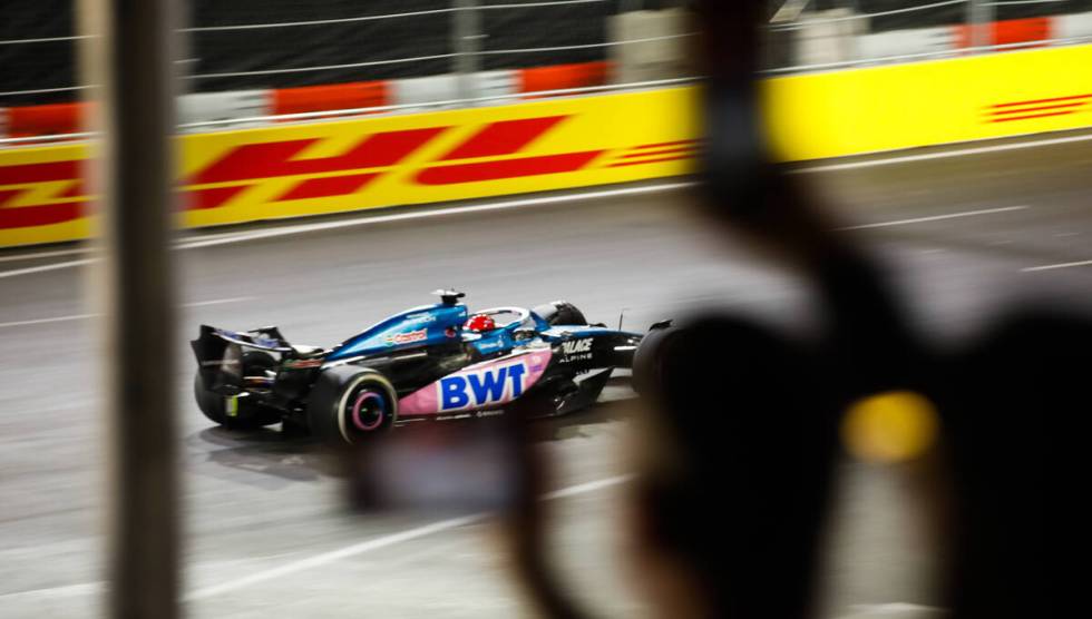 Fans cheer on Alpine driver Esteban Ocon during the final Formula 1 Las Vegas Grand Prix race o ...