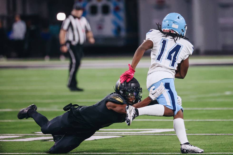 Centennial running back Khyren Harris (14) runs the ball during a class 4A state championship g ...