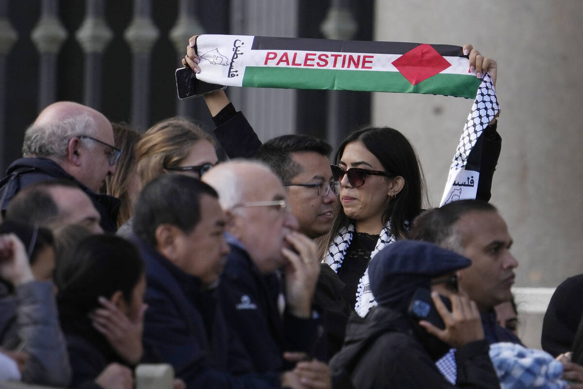 Members of Palestinian community attend at the Pope Francis' weekly general audience in St. Pet ...