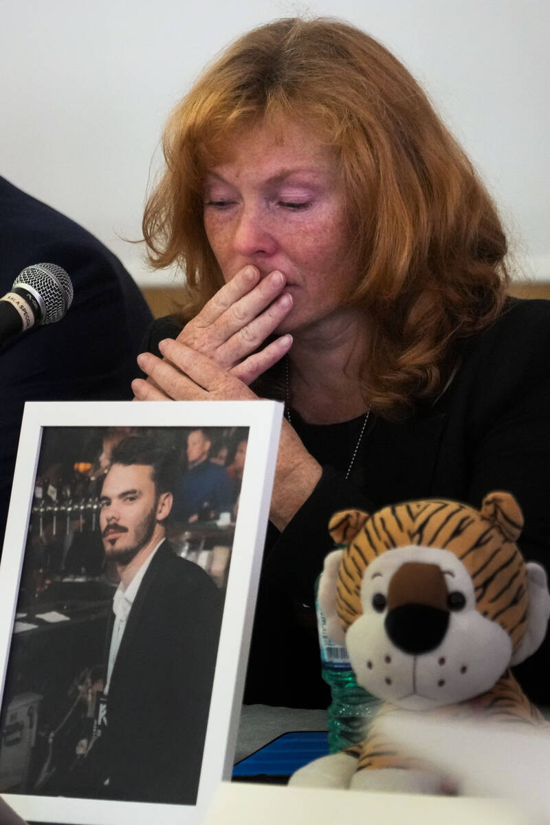 Evgenia Kozlov gets emotional during a press conference at the Italian Jewish Center in Rome, W ...