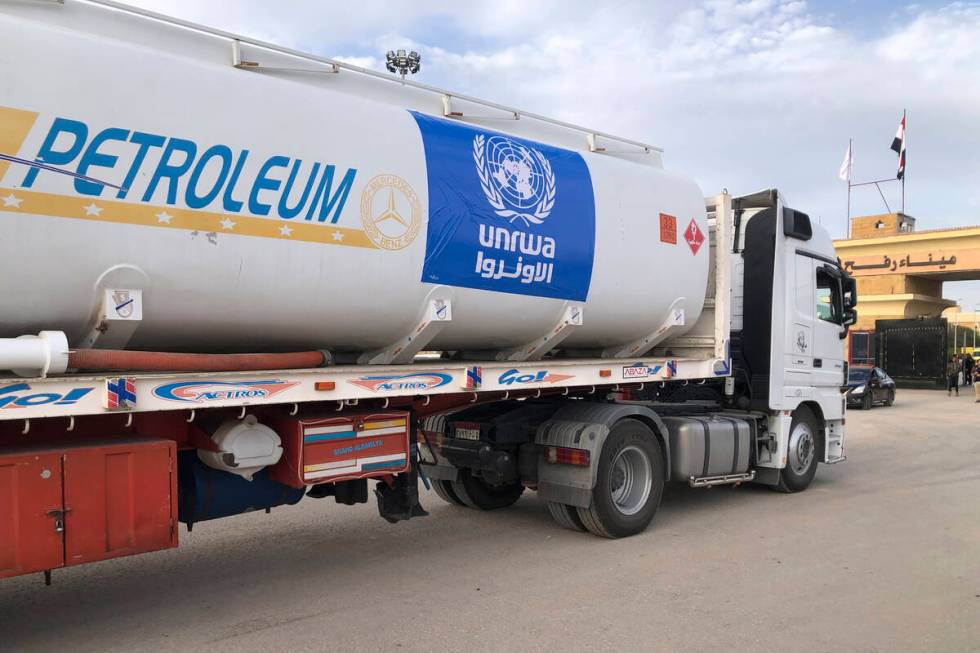 An Egyptian truck delivering fuel to the Gaza Strip waits to cross the Rafah border crossing be ...