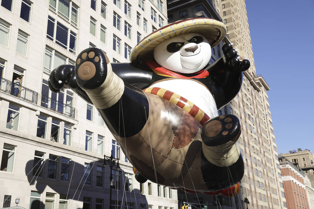 Kung Fu Panda's Po balloon floats along Central Park West during the Macy's Thanksgiving Day pa ...