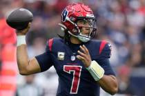 Houston Texans quarterback C.J. Stroud (7) drops back to pass against the Arizona Cardinals dur ...