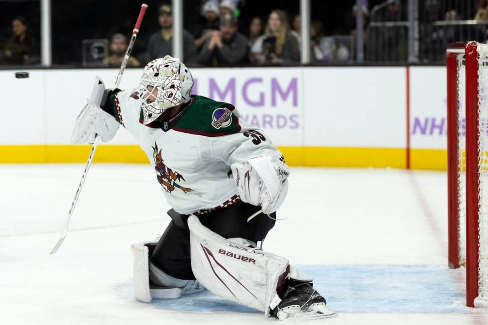 Coyotes goaltender Connor Ingram (39) saves the puck during the second period of an NHL hockey ...