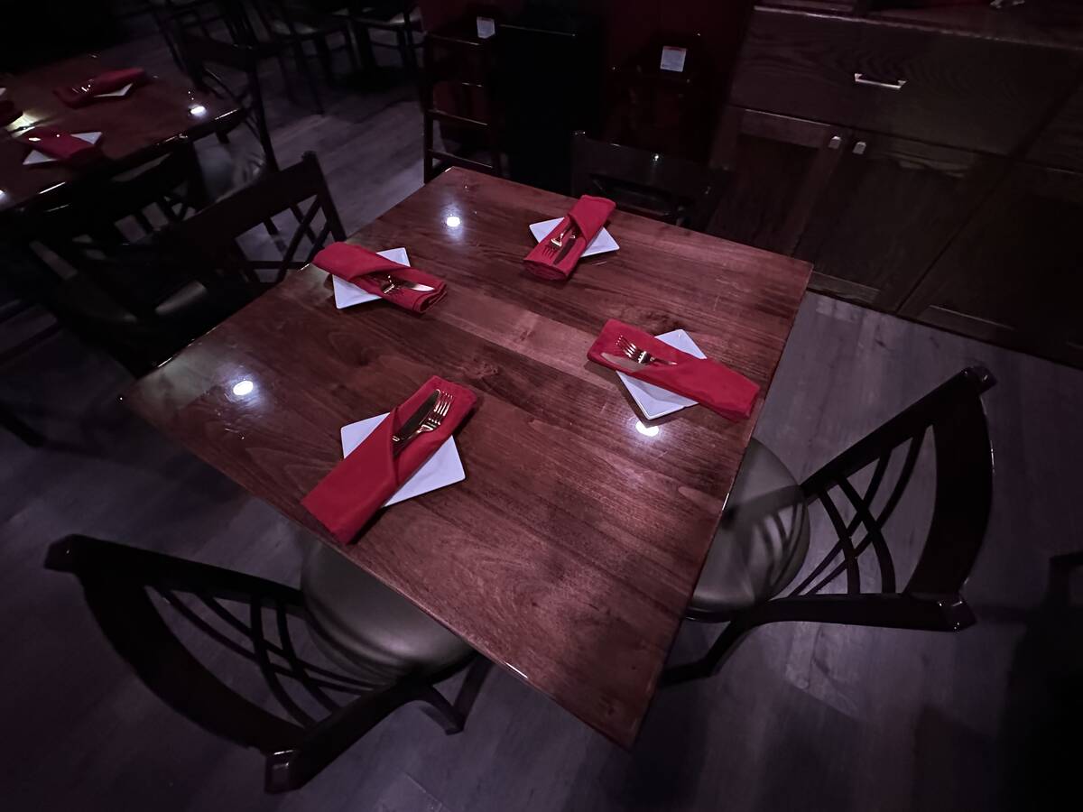 A dining table is shown at The Composers Room Showlounge & Restaurant at Historic Commercial Ce ...
