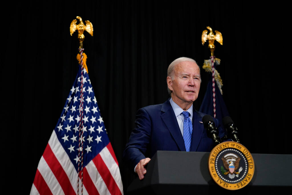 President Joe Biden speaks to reporters in Nantucket, Mass., Sunday, Nov. 26, 2023, about hosta ...