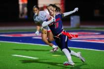 Coronado’s Sienna Siteine (16) runs the ball down the field during a flag football game ...