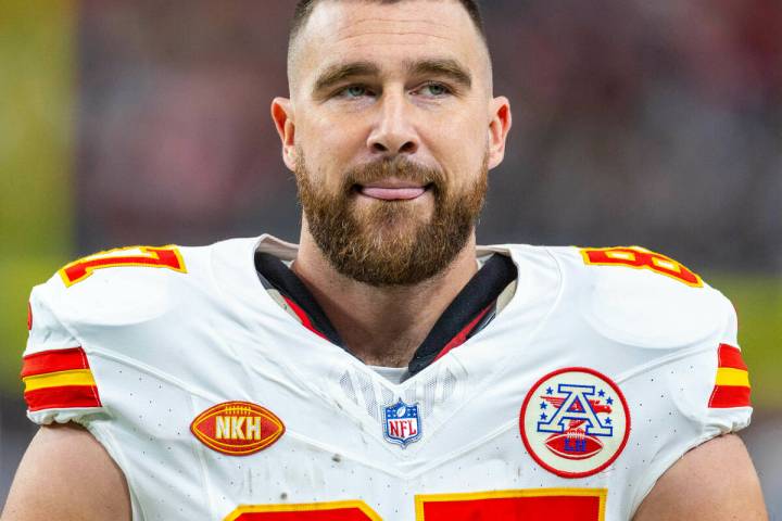 Kansas City Chiefs tight end Travis Kelce (87) stands with his tongue out on the sideline again ...