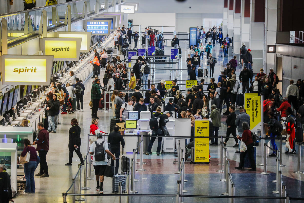 Guests at the ticket counters at Harry Reid International Airport in Las Vegas, Sunday, Nov. 19 ...