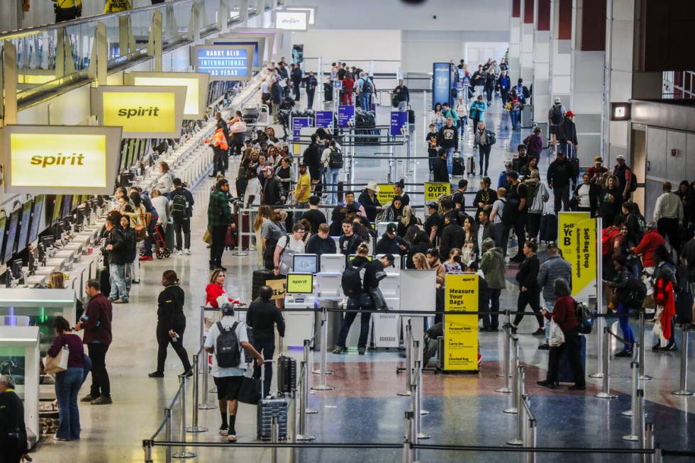 Guests at the ticket counters at Harry Reid International Airport in Las Vegas, Sunday, Nov. 19 ...