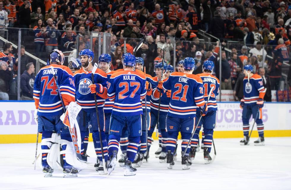 Edmonton Oilers players celebrate a win over the Vegas Golden Knights during a shootout in an N ...