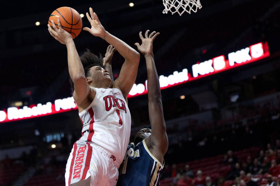 UNLV Rebels forward Jalen Hill (1) shoots against Akron Zips forward Sammy Hunter (11) during t ...