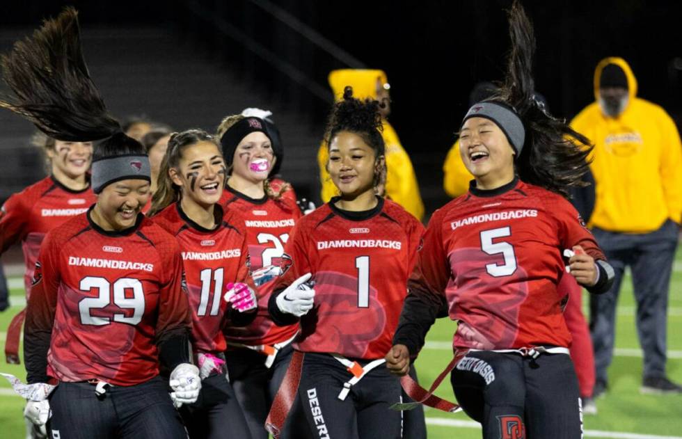 Desert Oasis celebrates their win against Bonanza in a high school flag football game at Desert ...