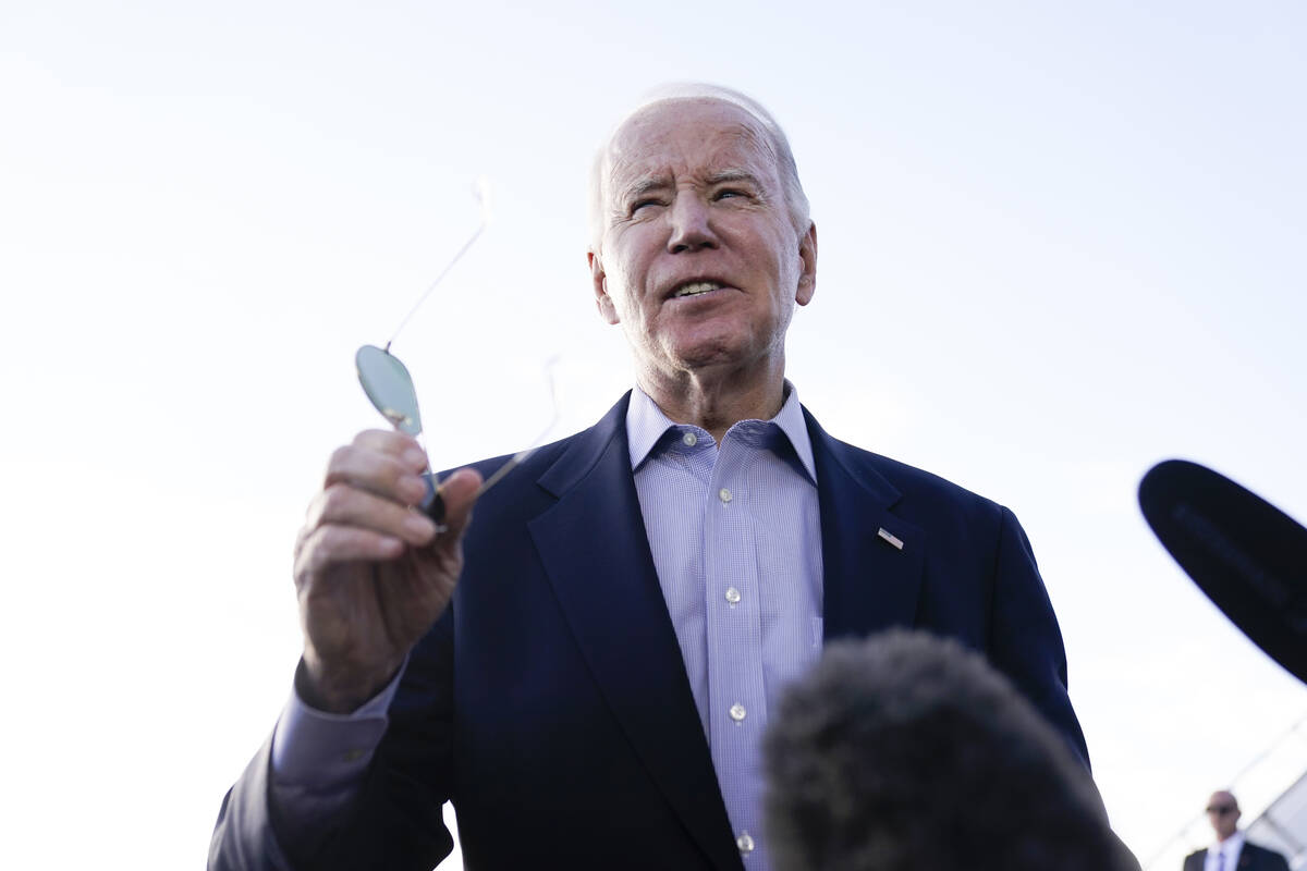 President Joe Biden speaks to the media before boarding Air Force One at Pueblo memorial Airpor ...